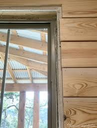 Break up endless cabinetry in the kitchen with a wall of open shelving. Simple Farmhouse Window Trim Domestic Imperfection