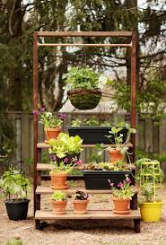 7 Steps To A Diy Vertical Garden For Your Planters Vertical Herb Gardens Plant Stand Vertical Garden Diy