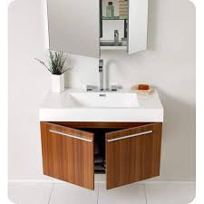 For makeovers where there is existing plumbing, a floor mounted vanity can be a good choice for concealing plumbing and covering. Brown Wooden Wall Mounted Bathroom Vanity Rs 1500 Square Feet A J International Id 20002720355