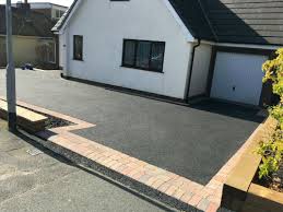 Design ideas for a large classic back driveway full sun garden in new york with a garden path and gravel. Driveway Paving Ruislip Harrow Pinner Uxbridge Watford Windsor Ealing