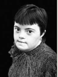 This is my daughter, Rachel Handlin. Tonight, she earned her full Bachelor  of Fine Arts degree in Photography & Media from the prestigious California  Institute of the Arts. Rachel has Down Syndrome.