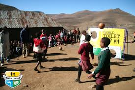 Playing The World Toilet Cup Game In Lesotho