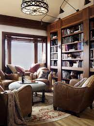 The upholstered leather bench serves as an ottoman, coffee table and extra seating. Warm And Cozy Living Room 10 Ideas Town Country Living