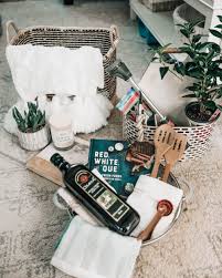 The best way to celebrate a housewarming is with a family and friends game night! Housewarming Gift Basket Ideas Pretty In The Pines New York City Lifestyle Blog