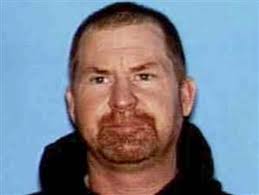 Survivalist sought in killing of wife and two young daughters
