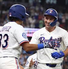 51-50 - Rangers rebound, wreck White Sox 10-0