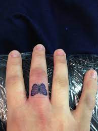 Butterfly Finger Tattoo Number Two Finger Tattoo Designs Butterfly Tattoo On Shoulder Tattoos