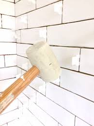 The tile around a bathtub is part of an overall waterproofing system, which helps keep water from damaging the floor or walls beneath the installation. A Diyer S Guide To Waterproofing And Tiling A Bathtub Shower Ugly Duckling House