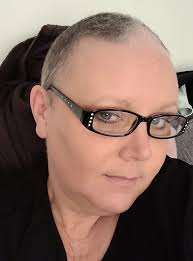 Will hair grow back grey after chemo?