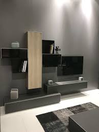 There are many elegant and creative ways to separate, or more precisely to signify the symbolic border between the kitchen and living room premises without actually creating different rooms with walls and doors. Show Stopping Modern Wall Units For Your Living Room