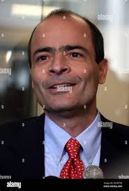 InBev Chief Executive Officer Carlos Brito speaks with reporters