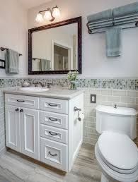Consider using wall mounted fixtures with an extra high backsplash. Bathroom Backsplash Tile Houzz