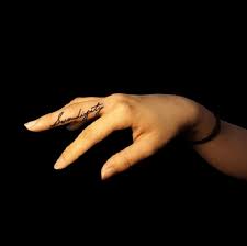 This printed snake tattoo runs over your middle finger. Tattoos On The Middle Finger Tattoo Artists Inked Magazine Tattoo Ideas Artists And Models