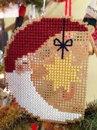 Cross stitch perforated paper patterns. Santa Moon On Perforated Paper Cross Stitch Christmas Ornaments Paper Christmas Ornaments Cross Stitch Patterns Christmas