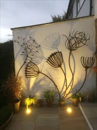17 Ideas Of Outdoors Wall Art Interior For Life Metalwallart Garden Wall Decor Garden Wall Garden Wall Art