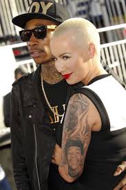 Rapper wiz khalifa talks cannabis, tattoos and his new album. Amber Rose Covers Wiz Khalifa Tattoo Photos