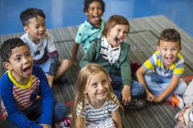 Kindergarten Students Sitting On The Floor Elementary Schools School Bundles Elementary Children