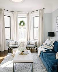If there is little room for a side table next to your sofa, position a narrow console behind a. Best Bay Window Treatments Measuring Guide Modern Farmhouse Living Room Bay Window Living Room Farm House Living Room