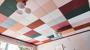These subtle choices are great accents to any room and will still flood your space with the lighting you want and need. How To Mask Ugly Drop Ceiling Tiles Using Just Paint Architectural Digest