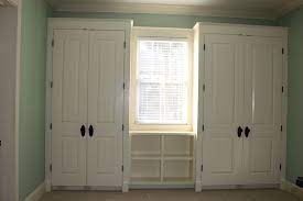 For each door, you'll need two stiles (the vertical parts), two rails (the horizontal parts) and one panel. Hand Crafted Bookcase And Storage Cabinets By Custom Craft Woodworks Remodeling Custommade Com