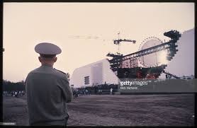 On july 21, 1990, roger waters staged a performance of the wall in berlin to mark the falling of the berlin wall, which had occurred eight months before. A Security Guard Watches As The Stage Is Built For Roger Waters The Security Guard Roger Waters Roger Waters The Wall
