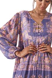 She asks wonka why they were laughing, and he states he believes it's from the cocoa beans. Spell Violet Juniper Gown Harper Tucker