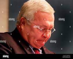 Oakland County Executive L. Brooks Patterson, left, and Detroit Mayor Kwame  Kilpatrick react to a comment during the Pancakes and Politics speakers'  forum titled "Economy, Regionalism and Race Relations, Revisited " at