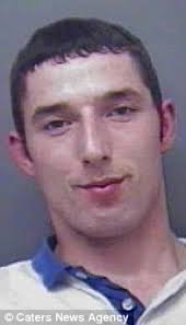 Axe-wielding armed robber who threatened teenager with double-bladed weapon  before marching him to cashpoint to empty bank account