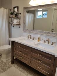 A mix of textures, materials, cabinet styles and architectural details makes the style feel as if it was pieced together bit by bit. Neutral Master Bath With Bronze Accents Bronze Bathroom Fixtures Champagne Bronze Bathroom Delta Champagne Bronze Bathroom