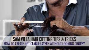 Point the scissors vertically down toward the hair, in the middle of the piece of hair. How To Blend Choppy Layers Hair Video