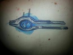 A mass relay is an enormous device used for mass transit across the galaxy. Mass Relay Tattoo Mass Effect Mass Effect Tattoo Inspirational Tattoos Tattoos