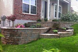 Pin By Lindsey Lopez On House Exteriors I Love Tiered Landscape Front Yard Landscaping Design Landscaping Retaining Walls