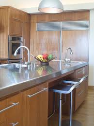 The handy piece of furniture makes an excellent kitchen island at a fraction of the cost. 10 Beautiful Stainless Steel Kitchen Island Designs
