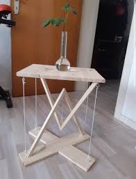 A Tensegrity Table Holding Itself Up With Nothing But Strings In 2020 Woodworking Projects Furniture Woodworking Plans Diy Woodworking Projects That Sell