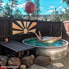 Floating fire pit pool heater. Wood Fired Stock Tank Hot Tub Stock Tank Pool Tips Kits Inspiration How To Diy Stocktankpools