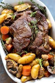 You can either place vegetables around roast for the last hour of cooking or wait until the roast is done, remove it (keeping it covered and warm), then put carrots and potatoes in the oven and cook, covered, until tender, approximately 45 minutes. Dutch Oven Pot Roast Potatoes Carrots And Mushrooms Ready To Be Served Pot Roast Recipes Dutch Oven Pot Roast Oven Pot Roast