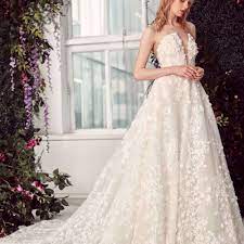 A ball gown wedding dress features a fitted bodice paired with a wide and full skirt. 26 Best Princess And Ball Gown Wedding Dresses Of 2021