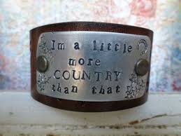 I M A Little More Country Than That By Bellanottedesigns 30 00 Stamped Leather Cuff Leather Cuffs Bracelet Metal Stamping