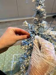 How To Make Tree Flocking With Dollar Store Ingredients Diy Pallet Christmas Tree Easy Christmas Diy Tomato Cage Christmas Tree
