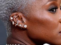 This will cause the outer end of the nose stud to move away from the surface of the skin, giving you more room to snip it. How To Remove Piercing Earrings And Septum Rings Expert Tips Allure