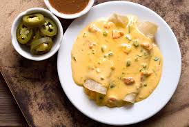 Soft Cheese Tacos Are A Rolled Taco Prepared With Corn Tortillas Stuffed With Cheese Than Smothered In Creamy Chile Co Cheese Tacos Soft Cheese Mexican Cooking