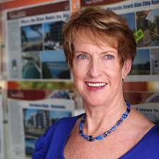 Real estate agent back in the hot seat