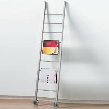 Get a ladder rack to properly store your ladders. Magazine Rack Of The Week Wooden Magazine Rack Magazine Rack Ladder
