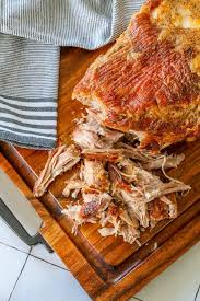Roast until you can easily pull meat by gently twisting with a fork when inserted into pork shoulder, about 8 hours. The Best Crispy Baked Pork Shoulder Recipe Sweet Cs Designs