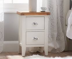 Your bedroom's not complete without the perfect bedside table to keep your essentials within fumbling distance. Eden Oak And White 2 Drawer Bedside Table
