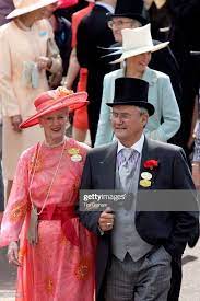 Queen Margrethe Of Denmark Wearing An Elegant Hat And Bright Coral Elegant Hats Queen Margrethe Of Denmark Royal Ascot Races