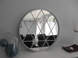 Round mirrors with gentle curved shapes can give the room a softer touch as well as adding space. Star Mirror Ikea Hackers