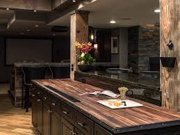 You can choose to buy a manufactured countertop or just build the counter with wood. Basement Design Build Walnut Butcher Block Countertop Rustic Home Bar Chicago By Mood Design Build Houzz