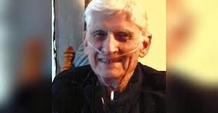 John T. White Obituary