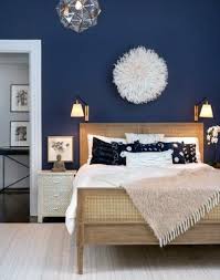 When decorating a beach house, keep with a coastal paint color palette by leaning on bright whites, strong blues, and calm greys. Top 50 Best Navy Blue Bedroom Design Ideas Calming Wall Colors